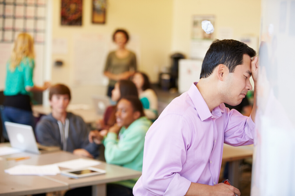 teacher struggling with difficult classroom behavior problems